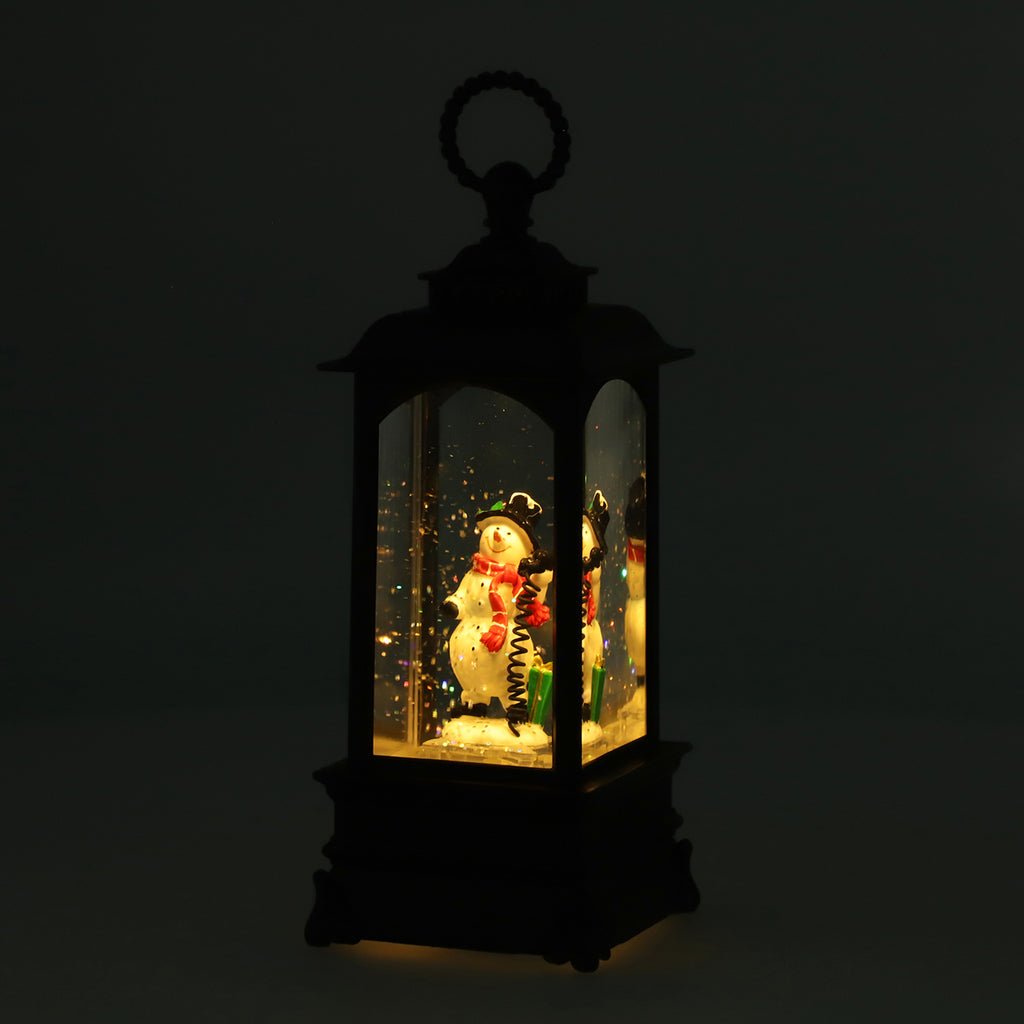 Laterne mit warmer Beleuchtung und Musik