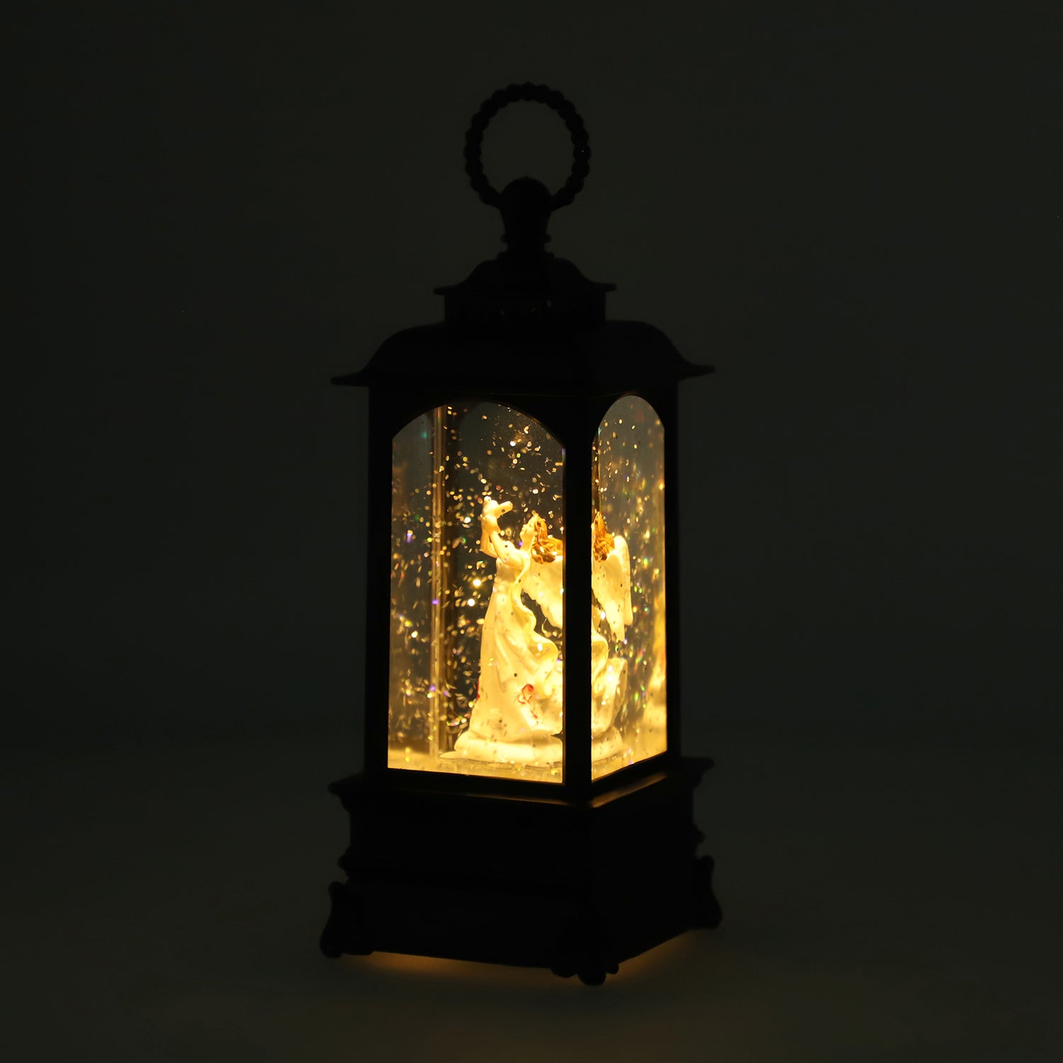 Laterne mit warmer Beleuchtung und Musik